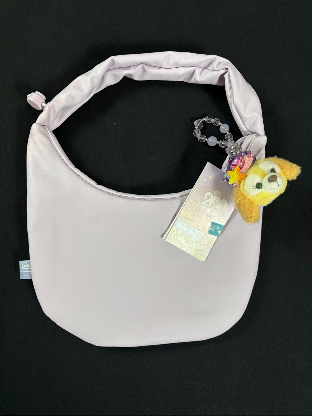 NWT Disney Duffy and Friends CookieAnn Purple Lilac Shoulder Bag w/ Plush Charm
